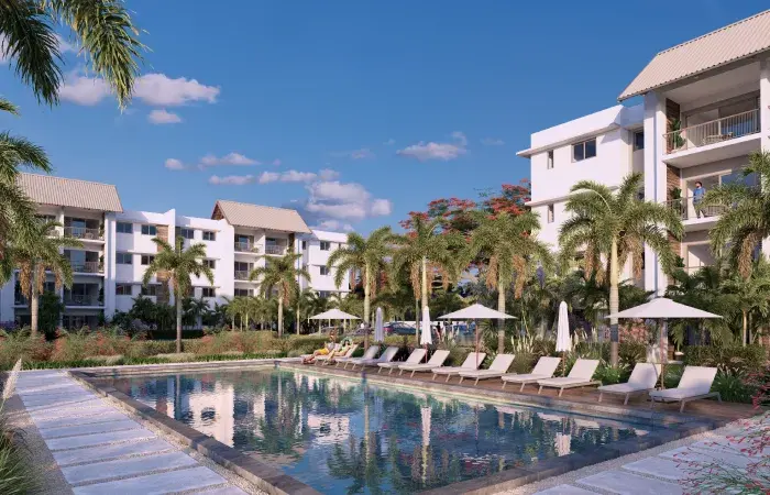 Rendering of white apartment buildings around a swimming pool with sun loungers, parasols and palm trees at Beau Plan