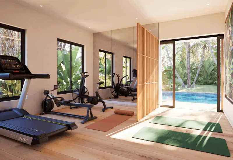 Rendering of the Mosaique retirement village gym with treadmill, bikes and yoga mats opening onto a pool and tropical garden