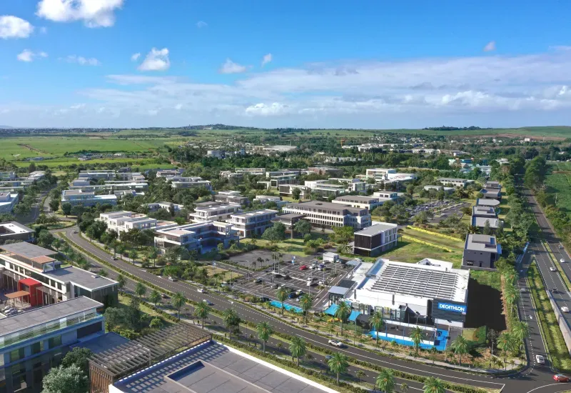 Aerial view of Beau Plan's Business District with office buildings, a Decathlon store and the northern motorway